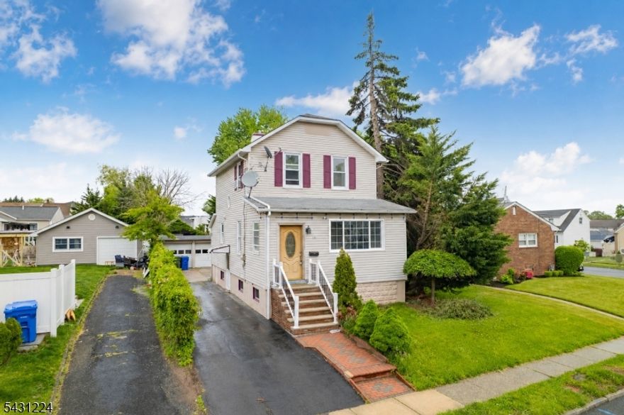 Located in a desirable neighborhood just under a 5-minute walk from Warinanco Park, this beautifully updated home offers comfort, convenience, and exceptional outdoor living. Enjoy easy access to scenic walking trails, playgrounds, sports fields, picnic areas, paddle boating, and community events at one of Union County's most popular 205-acre park.This move-in ready home features 3 bedrooms and 1.5 baths  Renovated in 2026 with, brand-new tile and laminate floors, large living room, dining room, an updated spacious kitchen with new cabinets and appliances. A finished basement with its own private walk-out entrance along with large storage area, providing excellent additional living or entertainment space. Outside, you'll find a large Trex deck perfect for relaxing or entertaining, along with a detached 2-car garage and a well-kept yard.The home is also conveniently located near shopping, restaurants, schools, and major transportation routes. With easy access to Route 1 & 9, major highways, and public transportation, commuting to Newark and New York City is simple and convenient.