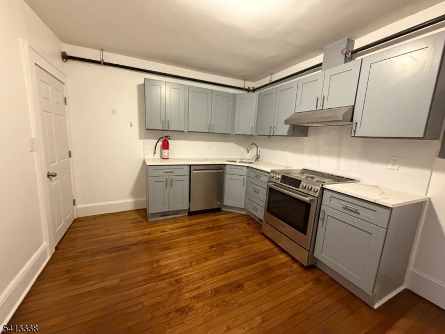 Welcome to your new charming home in the heart of Maywood's flourishing business district! This oversized 2 bedroom apartment was just renovated and boasts an open concept living space. Your comfort is ensured with an assigned parking spot, providing hassle-free access to your residence. Commuting to NYC is a short breeze with easy access to both bus and train options. Perfect for those seeking convenience, comfort, and amenities in Bergen County! Schedule your viewing today and experience the charm of urban living at its finest with this prime location!