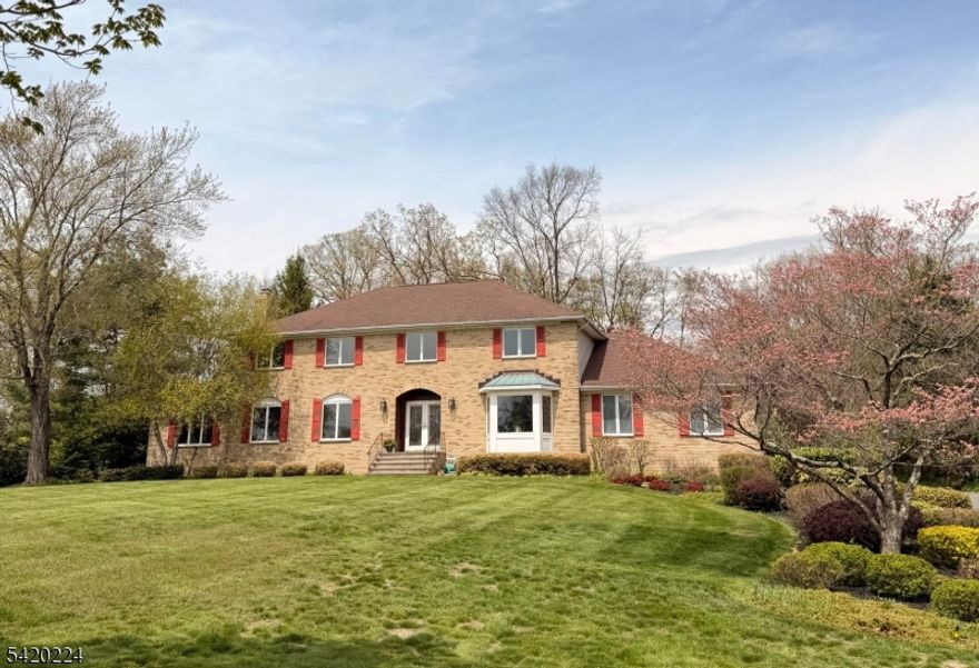 Great opportunity to own this spacious and stately brick front Colonial on 1 acre+ level property! 4 bedroom, 3 full baths, 2 fire places and 3 car garage. Cul-de-sac location in the Ironia section of Randolph!  From the 2 story entry floyer, a curved staircase leading to the 2nd floor. 4 good size bedrooms 2nd floor with wall to wall carpet over hardwood floors underneath. You will be impressed with the Large Mstr Bdrm w/wlk-in clst, sitting area. Updated Mstr Bth featuring double sink, shower and separate jacuzzi tub. Bathroom hallway also updated. The Fm Rm features frplc, sliders to the oversized deck, and parklike level backyard. Updated and generously proportioned eat in kitchen open to family room.  This lovely home will accomodate large gatherings and provide all the comforts and conveniences you desire in a home!