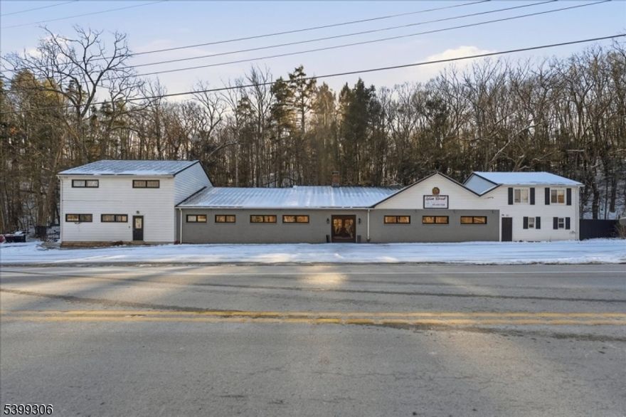 ATTENTION INVESTORS! Presenting a fabulous, renovated mixed-use property offering exceptional income potential and a 10% CAP RATE. This versatile building features three rental units, including two updated apartments, dedicated office space, and a spacious event/banquet hall area. Flexible configuration allows for potential restaurant or catering use, making this an ideal opportunity for investors, owner-operators, or business owners seeking additional revenue streams. The property has been thoughtfully improved and well maintained, ensuring strong rental appeal and long-term stability. Don't miss your chance to own this high-yield, multi-functional property with countless opportunities for growth and expansion. A must-see for serious investors!