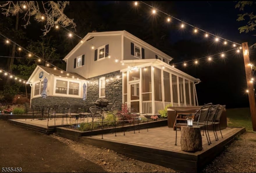 COMPLETELY RENOVATED - 1903 farmhouse with including reclaimed wood walls, 3 bathrooms, new kitchen, new roof, new electric, new windows, screened-in porch and much more!!  Accommodations on the main level include a queen-sized bed and full bathroom/shower. Nearly 3 acres with a huge pond and stream on the property with abundant fishing.  You'll love the new hot tub & 2 large patios, too!  Large platform deck has beautiful mountain, park and pond views.  Kittatinny State Park surrounds the property, completely secluded, with numerous hiking and biking trails.  Enjoy your FULLY FURNISHED farmhouse and all its serenity  Live the dream just one hour from NYC but a world away.  Perfect for large gatherings or peaceful serenity, you can enjoy this amazing spot yourself or on a part-time basis while collecting strong revenue from proven AIRBNB or VRBO history!  This is a beautiful find with great attention to detail - with EV charger, too! EXTRA, EXTRA:  Seller has gone to board with attorney and engineer and received conditional approval for a 20x20 addition on end of house.  It is about 800 sq ft. lower level consists of a family room, full bath, kitchen with 2 level floor to ceiling windows.  Upstairs covers 2/3 with a loft. Included is complete Architect plans, survey, plus contractor estimate.   Estimated cost to complete $100k.NEW INTEREST RATES & NEW LOWER PRICE!