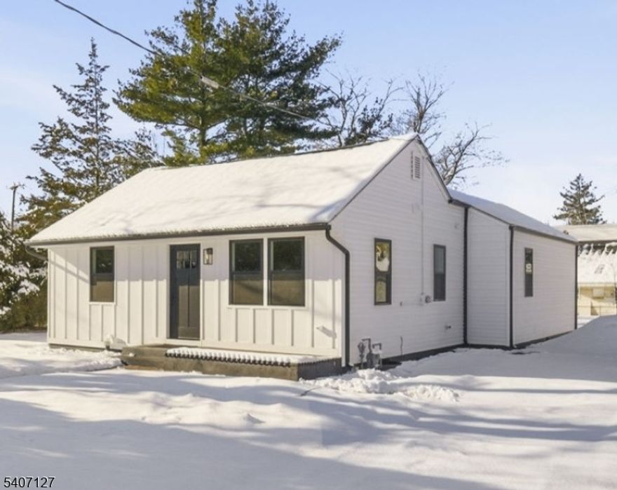 Welcome to this beautifully rebuilt ranch-style home with low taxes located at 1299 Englishtown Road in desirable Old Bridge. Renovated in 2026, this 3-bedroom, 2-full-bath home has been completely rehabbed from the foundation up using premium materials and high-end finishes, offering decades of worry-free living. The open and inviting layout features hardwood flooring and recessed lighting throughout. The modern kitchen showcases smart stainless steel appliances, quartz countertops, a marble backsplash, and ample cabinetry providing plenty of storage. Both bathrooms are thoughtfully updated with sleek finishes and glass shower doors. Additional features include an attic with plenty of crawl space and a large backyard, perfect for outdoor enjoyment. Ideally located near restaurants, shopping, and schools, this move-in-ready home delivers quality craftsmanship in a highly convenient location.