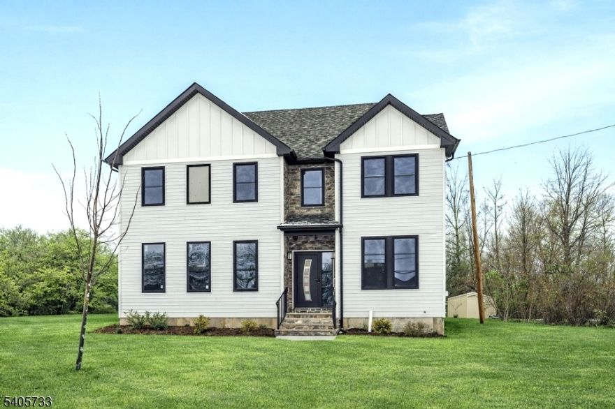 Welcome Home! - WOW! This Brand-New Construction just built - offers an elegant front elevation, 4 bedrooms, 2.5 baths, a full basement, and a 2-car garage. Step into the inviting foyer that leads to the living room, then flow into the open-concept gourmet kitchen, featuring a large island, breakfast area, and dining room, with door to a private backyard.The first floor boasts 9' ceilings, an elegant powder room, and hardwood floors throughout. The kitchen is equipped with plenty of cabinets, GE stainless steel appliances, quartz countertops, a tiled backsplash, hardwood flooring, recessed lighting throughout, modern light fixtures, and tastefully painted walls.Upstairs, the luxurious primary suite offers walk-in closets and a spa-like primary bathroom with dual sinks, a free-standing tub, and an oversized shower with an elegant glass enclosure. Three additional generously sized bedrooms and a full bathroom are conveniently located next to the laundry room. Planty of storage. Enjoy a full 9' basement, can be finished and 10-year home warranty. Paved asphalt driveway 14? wide along the property line.  Make this your new dream home today!