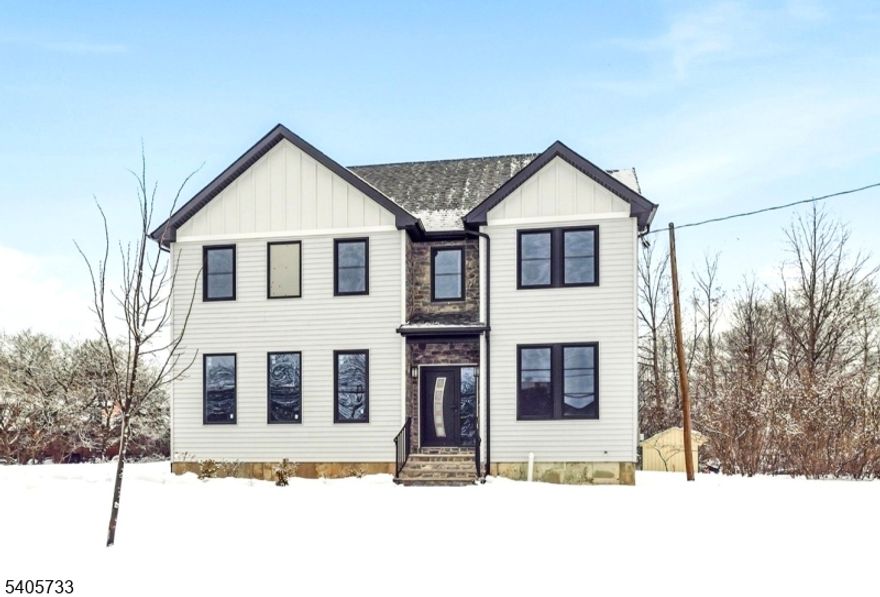 Welcome Home! - WOW! This Brand-New Construction just built - offers an elegant front elevation, 4 bedrooms, 2.5 baths, a full basement, and a 2-car garage. Step into the inviting foyer that leads to the living room, then flow into the open-concept gourmet kitchen, featuring a large island, breakfast area, and dining room, with door to a private backyard.The first floor boasts 9' ceilings, an elegant powder room, and hardwood floors throughout. The kitchen is equipped with plenty of cabinets, GE stainless steel appliances, quartz countertops, a tiled backsplash, hardwood flooring, recessed lighting throughout, modern light fixtures, and tastefully painted walls.Upstairs, the luxurious primary suite offers walk-in closets and a spa-like primary bathroom with dual sinks, a free-standing tub, and an oversized shower with an elegant glass enclosure. Three additional generously sized bedrooms and a full bathroom are conveniently located next to the laundry room. Planty of storage. Enjoy a full 9' basement, can be finished and 10-year home warranty. Paved asphalt driveway 14? wide along the property line.  Make this your new dream home today!