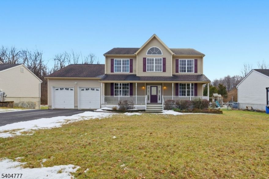 Welcome home to 10 Windsor Drive in Newton. This beautifully maintained five-bedroom, 2.5-bath residence offers the perfect blend of comfort, style, and natural surroundings. Hardwood floors span the first level, complemented by an oversized two-car garage and a serene backyard that backs directly to a protected nature conservancy. The updated kitchen features granite countertops, a tile backsplash, and LED under-cabinet lighting, opening seamlessly to the formal dining room?ideal for effortless entertaining. Sliding glass doors from the eat-in area lead to a covered deck, perfect for morning coffee, reading, or summer barbecues. Elegant French doors connect the family room and dining room, adding architectural charm and warmth. Upstairs, the spacious primary suite impresses with a large walk-in closet and a private bath featuring a jetted tub and separate shower. A conveniently located second-floor laundry adds everyday ease. Relax on the welcoming front porch and enjoy neighborhood charm, or take advantage of Newton Township amenities, including free access to the town pool and a variety of recreational activities. Move-in ready and thoughtfully designed?this is a home you?ll love coming back to.