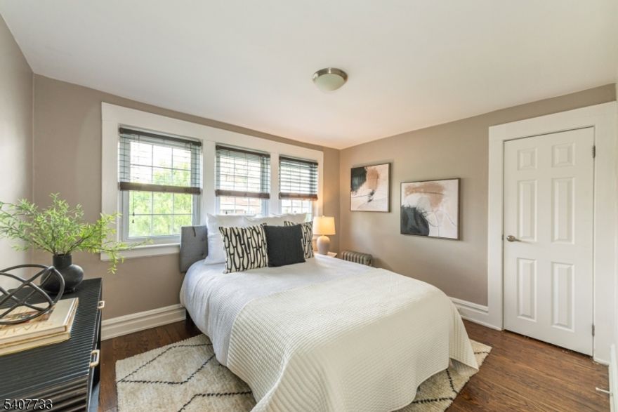 ABSOLUTELY ADORABLE, WELL-MAINTAINED THREE-BEDROOM COLONIAL NESTLED ON QUIET, TREE-LINED STREET IN HIGHLY SOUGHT-AFTER NEIGHBORHOOD.  This home blends classic character with modern updates.  The main level welcomes you with a spacious living room and formal dining room with sliders to a large deck, perfect for dining alfresco.  The home features gorgeous hardwood floors throughout and includes a convenient first floor mud room and powder room.  The heart of the house is a sleek kitchen equipped with SS appliances, including a gas stove, double-door fridge, microwave and dishwasher.  Upstairs you will find three spacious bedrooms and a pristine full bath.  The finished basement offers incredible versatility with an additional full bath, a bonus room for storage and hook ups for washer/dryer.  Step outside to enjoy the expansive, fenced backyard complete with storage shed. Ideally located close to parks, schools, shops and dining for the perfect combination of suburban tranquility and everyday accessibility. New roof and furnace (2023). Water heater (2022)