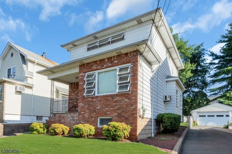 Don't miss this opportunity to live in a great location in Nutley. This home features a large open living room/dining room/kitchen combo that provides flexible space for relaxing and entertaining. The main level also offers a bonus sun room. The second floor features 3 bedrooms and a full bath. The finished basement has a full bathroom and separate entrance. The oversized two car garage is equipped with gas for heating, and has additional space to provide extra storage or to accommodate hobbies. The large driveway offers parking for several cars.