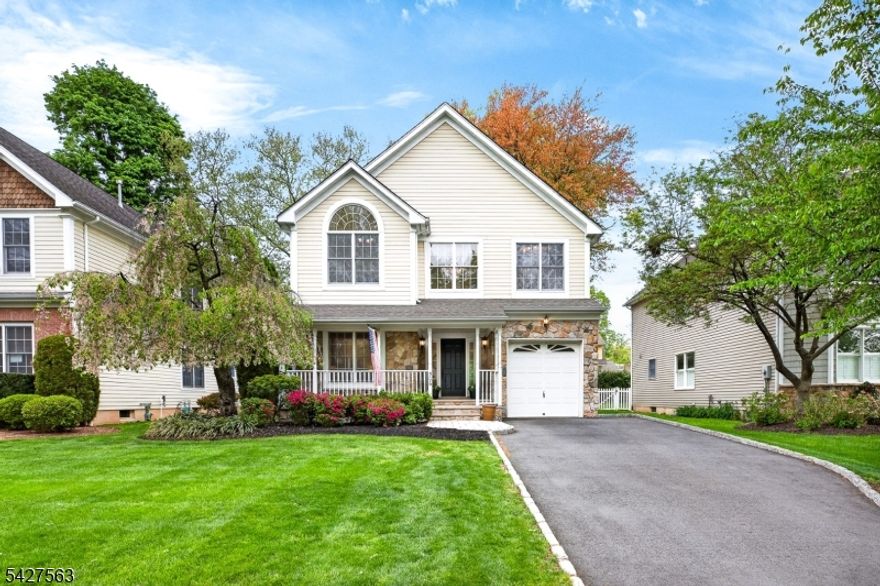 Just steps from schools, parks, and downtown Westfield, this special home has been lovingly cared for by its original owners since it was built in 2003. Perfect for buyers seeking convenience, functionality, and style, it offers upscale design paired with the everyday ease of a highly walkable neighborhood. Step in from the welcoming front porch to a spacious, open main level designed for both entertaining and daily living. The kitchen features stainless steel appliances, sleek countertops, and a large island, flowing seamlessly into the cozy living area with a gas fireplace. For more formal occasions, the dining room is ideally positioned just off the kitchen for gatherings large or small. A powder room and open living room complete the first floor. Upstairs, the second level offers a relaxing primary suite with two expansive closets and a beautifully renovated ensuite bath completed in 2024. Three generously sized additional bedrooms, another recently renovated full bath, and a convenient laundry room complete this floor. The third-floor walk-up provides exciting future potential for a playroom, home office, or guest space, while the finished basement adds even more room for recreation and flexible living. Come experience the warm, comfortable lifestyle this home has to offer.