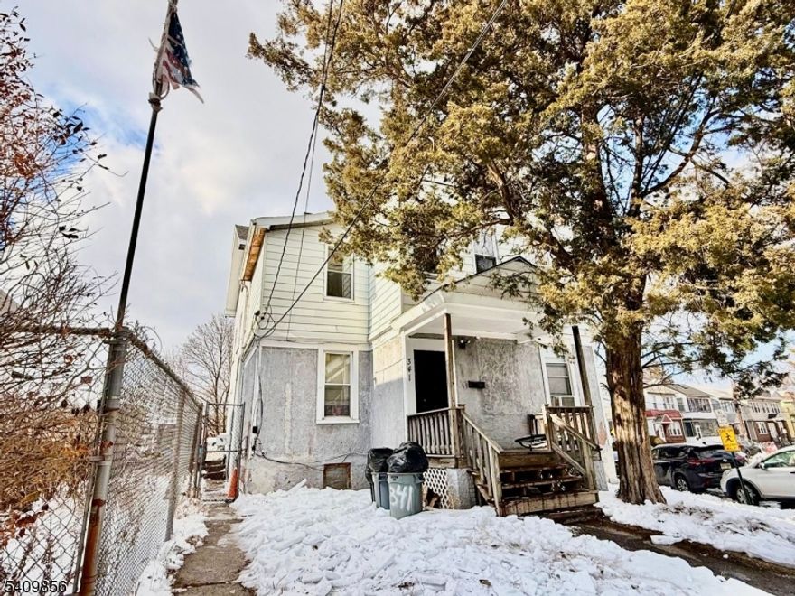 Legal 3-family home with separate utilities. The property features 4 bedrooms and 4 bathrooms, situated on an extra-large lot with ample parking. Includes a full basement and private yard. Located in a prime area close to schools, restaurants, shopping, and NYC transportation.