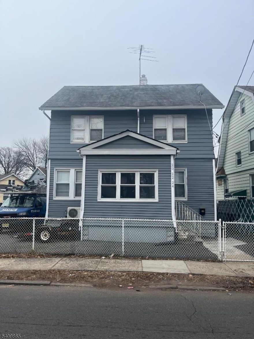 Move-in ready, well-maintained, and recently renovated 3-bedroom, 2.5-bath home with an additional room. The finished basement features one full bath and a large bedroom with ample space. There is also a finished, spacious bedroom in the attic. Recently paved asphalt parking provides space for up to four additional cars. Enjoy a large backyard perfect for gatherings, outdoor activities, and entertaining, along with an exclusive driveway. Mini-split ductless heating and cooling help reduce energy costs. Conveniently located near major highways and parkways, restaurants, and shopping centers. Walking distance to NJ Transit bus stop and Bus 107 to New York.