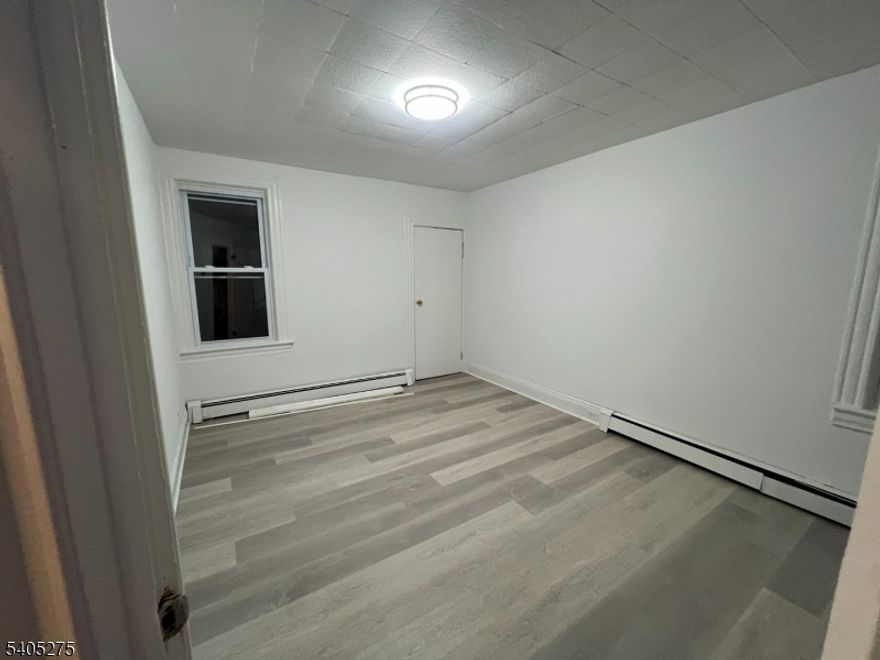 Spacious and updated 3-bedroom, 1-bath first-floor rental located in Passaic, NJ. This apartment features brand-new kitchen cabinets and countertops, a refreshed bathroom, and fresh paint and flooring throughout. Enjoy an oversized eat-in kitchen with plenty of room for dining, along with a large, bright living room perfect for everyday living or entertaining. Convenient first-floor layout and competitively priced for today's rental market. A great opportunity that won't last long, schedule your showing today!