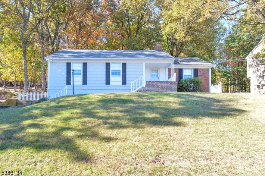 Charming well maintained 3 bedroom 1.5 bath ranch in a quiet residential area with a 2 car garage.  The entry flows into a large living room to relax or entertain (wood burning fireplace) and a dining area with hardwood floors.  There is a stairway off the entry to the unfinished attic giving potential for additional expansion. The eat in kitchen has ample cabinet space and updated appliances.  There is a large private deck off the backyard.  The primary bedroom has a half bathroom and there are 2 additional bedrooms and a hallway bathroom.  The unfinished basement is good sized with laundry and plenty of room for storage.  There is a large 2 car attached garage which you can access thru the basement. The driveway accomodates multiple vehicles.  This home has been well cared for by the owner including many updates.  Make this your new home today!