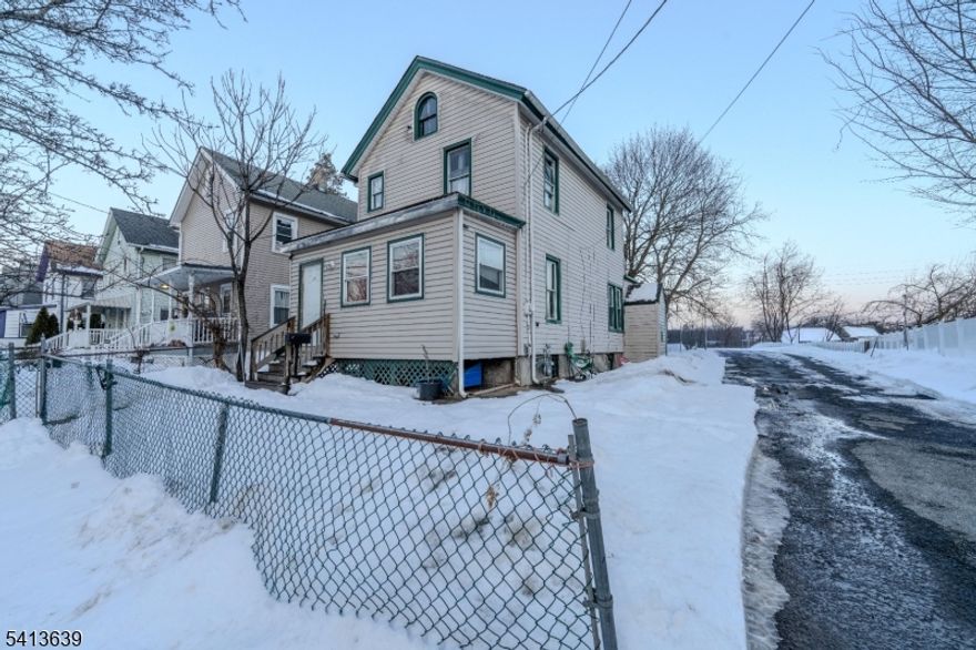 Unlock the hidden potential of this Plainfield gem! Nestled on a lot with unrivaled parking space, this 2-bedroom home plus office is awaiting your creative updates. While the home needs some TLC, it offers a functional floor plan and a dedicated workspace that is hard to find at this price point.Perfect for those who want to customize their living space from the ground up. Enjoy a large outdoor area and enough parking for a fleet of vehicles. Located with easy access to local amenities and transit. Property sold strictly As-Is. Come see the possibilities and turn this house into your dream home!