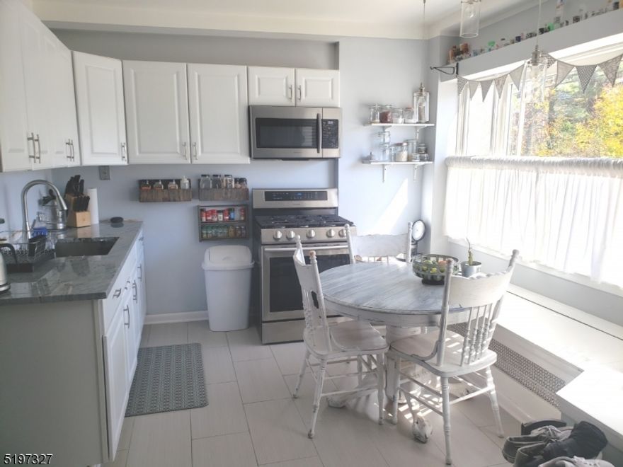 Adorable one bedroom, 2 bathroom apartment, with home office/guest room. This unit has been fully upgraded with stainless appliances, granite countertops and private laundry facilities. Plenty of natural sun light, street level, private entrance with a single parking space and off street parking. Some garage storage available. Close to Route's 46, 10, 15 and 80 in Morris County/Roxbury Township. Great for a couple or single professional. Near Hospital & Roxbury Mall Shopping Centers. References, credit, employment and background check required. Cats ok, no dogs or other animals. Non Smoking. Tenant pays all utilities. Annual Lease.  Available April 1, 2023.