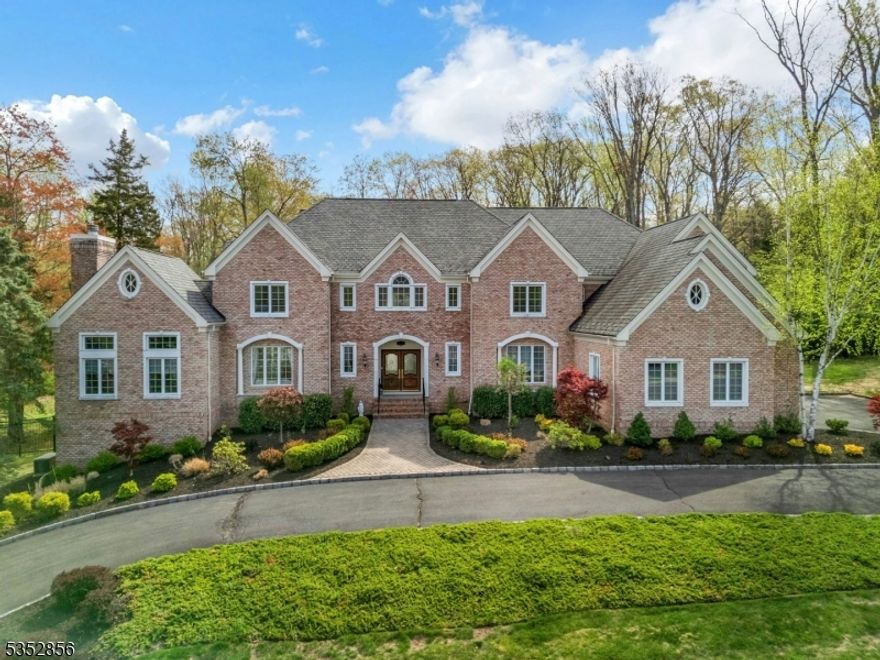 Welcome to 8 Stratford Court, a magnificent estate within the prestigious cul-de-sac of Brentwood Estates. From the moment you step through the grand foyer, you are immediately greeted by an atmosphere of elegance. The double staircase exemplifies the home's refined craftsmanship & timeless design. The heart of this home is the newly updated chef's kitchen, featuring two Wolf ranges & a side-by-side Sub-Zero refrigerator and freezer. The large center island & open floor plan is a space designed for seamless entertaining & everyday luxury. The first-floor ensuite, tucked away for privacy, is perfect for long-term guests. The office, complete with custom-built-ins & a cozy fireplace, offers an inspiring setting for study. Meanwhile, the gracious living room, enhanced by a charming balcony, overlooks the serene backyard, offering an effortless indoor-outdoor connection. The second floor offers a perfect bedroom-to-bathroom ratio, with five bedrooms & four baths, including a primary suite that serves as a serene escape. Here, you'll find two sitting areas, tray ceilings, a custom walk-in closet, & a grand primary bathroom w/ a jetted tub and expansive counter space. This exquisite residence also features plentiful private outdoor space, including a composite deck ideal for hosting gatherings, fenced-in yard and an expansive circular driveway, making this luxury haven a true standout. Conveniently located minutes from Route 78 and the Pringry School this home cannot be missed.