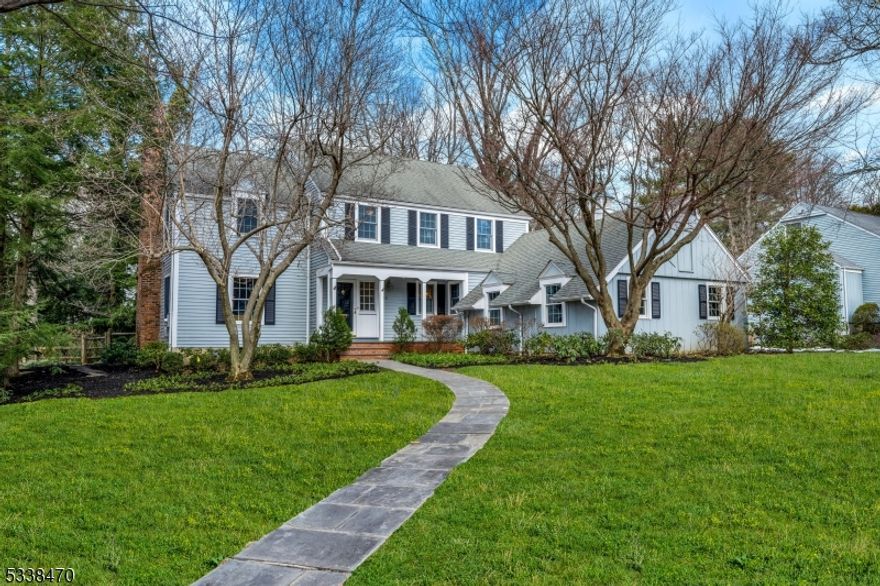 Perfectly poised in one of Summit's most desirable neighborhoods, this inviting 4 bedroom 2.5 bath colonial beautifully blends character, charm and curb appeal! Step inside this warm and welcoming home and prepare to fall in love! The sun-filled living room complete with oversized windows and a wood-burning FP sets the stage for sophisticated entertaining. Enter the formal dining room enhanced with custom corner cabinets with French doors that spill into the bright and spacious family room with custom built ins, is the perfect place to unwind! The double French doors allow for easy access to the level rear yard and patio. The spacious eat-in kitchen with custom cherry cabinetry, high end appliances including a 6 burner Wolf range and double ovens and a must have center island with seating is topped with granite countertops, all set upon radiant heated floors. The second floor is host to a gracious primary suite with a tray ceiling and multiple closets, an oversized luxe primary bath with jetted tub, a frameless glass shower and a double vanity accented with granite top.3 additional generously sized bedrooms with oversized closets, a spacious hall bath, and a bonus second floor laundry room complete this floor. The lower level, freshly painted with new carpeting is ideal for added leisure time! Located in the sought after Franklin School district, this beautiful home offers suburban living at it's finest! Whole house generator, 2 New units HVAC and tankless water heater 2022