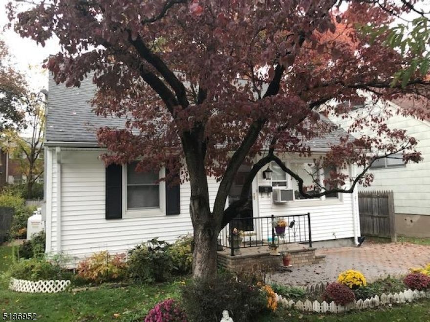 Cape with Four bedrooms and 2 Full baths! Wood like laminate flooring in Living Room and hallway. Great kitchen with addition out back that is now dining room! Full Bath on each floor. Partially finished basement and great work area. Flat backyard. Close to highways and transportation and walking distance to town.