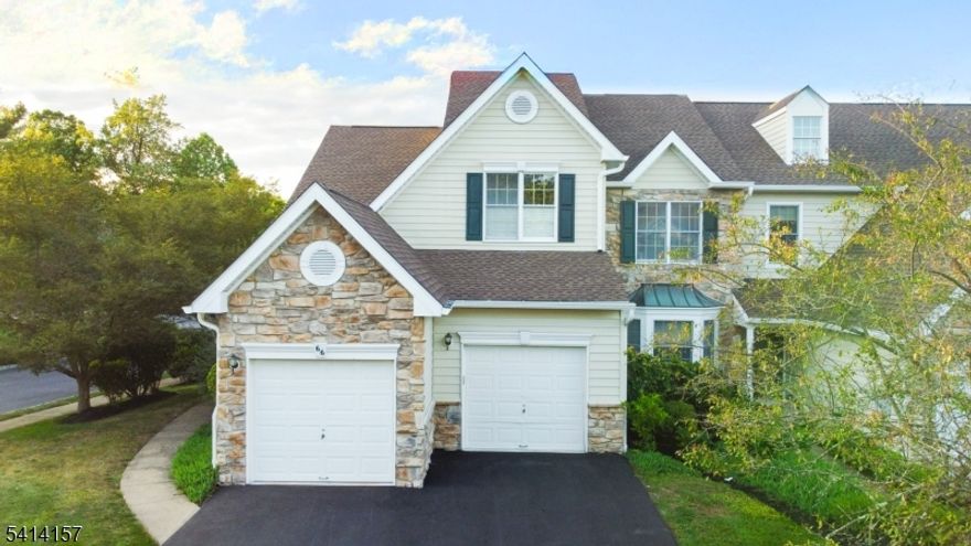 A beautifully maintained 3 beds 2.5 bath end-unit townhouse featuring a two-car garage is yours to call home. This home showcases hardwood floors throughout! The spacious kitchen is equipped with stainless steel appliances and 42-inch cabinets and ceramic flooring. The inviting family room includes a cozy gas fireplace. The primary suite offers a walk-in closet and a private adjoining bath. The lower level boasts high ceilings and provides the perfect opportunity to customize and create your ideal living space.