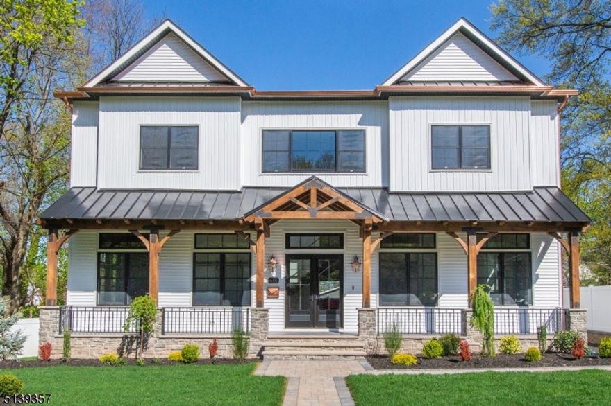 New construction modern farmhouse 6,200+ sq ft over 3 levels. Oversized entry doors & a stunning floating staircase. Open floorplan w/ 12 ft ceilings, wide-plank HW flooring, a formal LR, DR, FM w/ fireplace & 4-panel folding slider leads to an enormous wrap-around deck. Arguably the showpiece of the home, this dream kitchen has custom cabinetry w/ double pantry, a massive island, quartz counters, smart faucets, high-end Wi-fi appliances w/ chef range & secondary undercounter refrigeration, 2 dishwashers, 2 sinks, & wine cooler. An office ensuite and rear mud room finishes off the 1st floor. 2nd floor: 4 BRs, 3BA, laundry. All BRs w/ custom WICs. The MBR has vaulted ceilings w/ ceiling beams, a fireplace, double WICs. The amazing MBA: wet room w/ soaking tub, multiple shower faucets, an oversized teak vanity w/ marble counters, heated floors & towel warmer. The fully finished basement has a wine room, gym or yoga room, BR, full BA, laundry, additional living space, and double sliders that walk out to the backyard. The huge yard has a paver patio & firepit. Enjoy that patio on a rainy day as the deck features a rain drainage system. Love for dogs? The dog wash is perfect for your companion's pampering needs. The 3-car detached garage includes an electric car charger and is prewired for Wi-fi. Fantastic location near Brookdale Park, Upper Montclair village, shops, restaurants, express bus to NYC, and the train station. Home warranty included. A Rustic Appeal, LLC project.