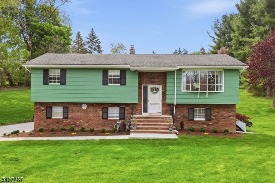Tucked away at the end of a quiet cul de sac, this move in ready bi-level offers space, style and a prime .7 acre setting! Featuring 3 bedrooms, 2.5 baths with a versatile bonus room, this home has been thoughtfully updated throughout. Kitchen boasts new white cabinetry, SS appliances, butcher block countertops, tiled backsplash and breakfast bar with a separate dining area that flows seamlessly into the spacious living room filled with an abundance of natural light. All bedrooms are conveniently located on the main level including a primary suite with a newly renovated en suite bath along with an additional renovated full bath for the secondary bedrooms. Lower level features a cozy family room with a WB fireplace, a bonus room currently used as a gym which is perfect for guest space, updated half bath and sliders leading to the backyard along with direct garage access. Additional highlights include a 2 car attached garage, HW flooring, recessed lighting, new AC wall unit, natural gas and major updates such as a new septic (2023), water heater and furnace (2024). All that's left to do is move in!