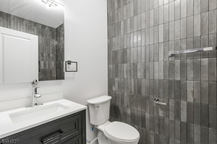 Welcome to this stunning new construction multi family home.Built in 2025, this exquisite property features two spacious units, each designed with luxurious finishes and timeless aesthetic. The first unit boasts three generous bedrooms and two and a half bathrooms spread across two well- appointed floors, including a beautiful recreational room with it's own entrance. Enjoy an open layout that grants natural light flowing seamlessly through the stylish living areas, creating an inviting atmosphere. The second unit also features three bedrooms and two bathrooms, offering an equally comfortable and spacious environment. Both units are equipped with one of one kitchens, high- end appliances and contemporary fixtures, ensuring that every single detail has been thoughtfully considered. The property boasts amazing curb appeal, complemented by its location among multiple newly built homes and newly planted trees that enhance the overall neighborhood aesthetic.In addition to its impressive interior and immaculate exterior, this home includes a two car garage and a large private backyard, offering ample space for outdoor activities and relaxation. With its ideal location and excellent craftsmanship this multi family home presents an excellent opportunity for investors or those looking to live in one unit while renting the other. This property comes with a 5 year tax abatement and 10 year builders warranty.