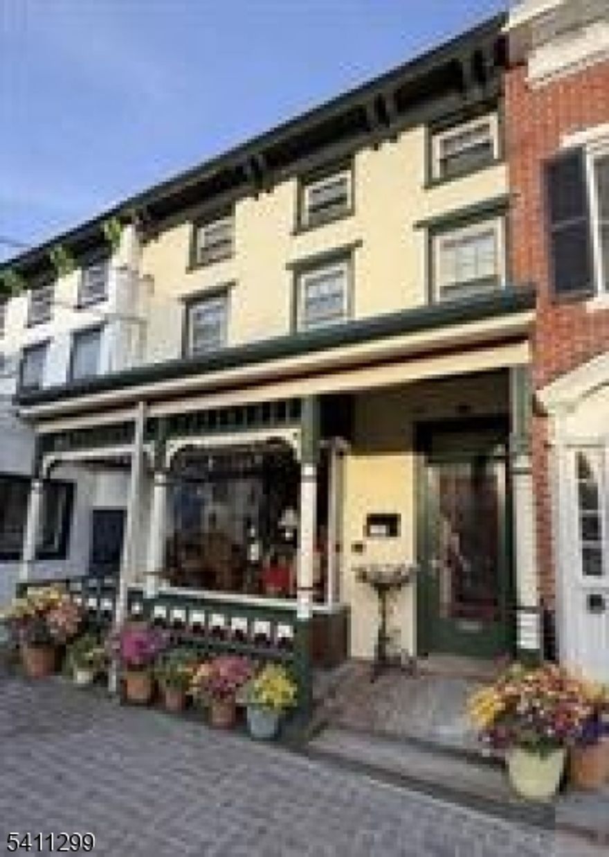 Ideally located in the heart of Lambertville, this fully leased three-unit investment property offers a rare opportunity to own a high-performing asset in one of the area's most desirable river towns. Just steps from renowned shops, acclaimed restaurants, popular coffee spots, the Delaware River, scenic towpath, and the bridge to New Hope, this property delivers exceptional appeal to both tenants and future buyers. Each of the residences is well maintained and in excellent condition, featuring comfortable layouts, abundant natural light, and strong rental demand. All units are currently occupied, providing immediate and reliable income from day one. A standout feature of the property is the expansive rear courtyard - an uncommon amenity in this central location - offering private outdoor space for tenants to enjoy and enhancing long-term tenant retention. With its prime walkable setting, proven rental performance, and close proximity to everything Lambertville and New Hope have to offer, this turnkey property represents an outstanding opportunity for investors seeking stable cash flow with long-term upside in a tightly held market.