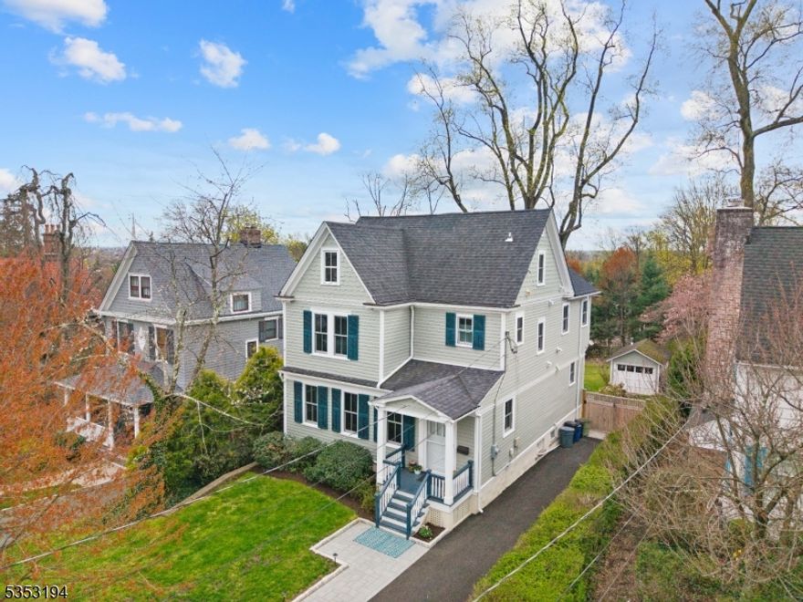 STUNNING CEDAR STREET HISTORIC BEAUTY IDEALLY LOCATED .5 MILES FROM DOWNTOWN MILLBURN IS PRISTINE & MOVE-IN READY! Welcome to 86 Cedar St, a charming early 20th century home exquisitely updated and modernized just two years ago. The inviting gray clapboard Victorian exterior holds within every amenity and accommodation for modern living with 4 Beds/3.1 Baths, high-end fixtures, all-new systems/utilities, and resort-worthy amenities like the gorgeous Plunge Pool set among flagstone patios, stone walls, flowering trees and gardens in the private Backyard. A dreamy Kitchen highlights the First Level with custom gray cabinetry to the ceiling, quartz countertops, large center island and professional appliances like Sub-Zero fridge, Wolf gas range and microwave and Bosch dishwasher. A bright bay window focuses the attention on the oasis-like Backyard before stepping into the adjoining Family Room/Sitting Room, which affords the same amazing views. A spacious formal Dining Room with original box-bay window, bright Living Room and vintage-look Powder Room complete this level. Access the second and third levels via restored hardwood staircases to find 3 Bedrooms and 2 full Baths. The Primary Suite features second Laundry, Backyard views, large Walk-in Closet and stunning ensuite Bath. The Third Level offers a 4th Bedroom and ensuite Full Bath. Move in and immediately enjoy lifestyle living in one of NJ's most sought-after towns with highly ranked schools and thriving downtown!