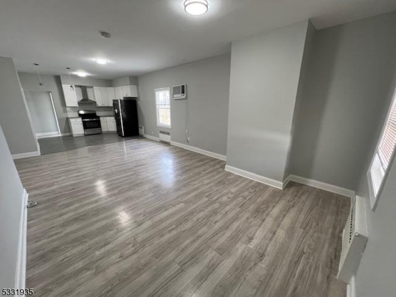 Newly renovated 3 bedroom apartment with open living space. Access to the yard. Detached garage and driveway giving lots of parking, and storage space. Good location, must see!