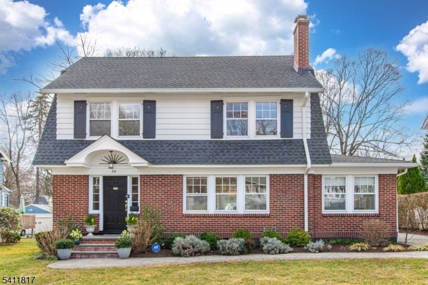 FOUR BEDROOM COLONIAL BEAUTY LOCATED ON HIGHLY DESIRABLE UPPER MONTCLAIR TREE-LINED STREET JUST TWO BLOCKS TO NYC TRAIN, AND LESS THAN A MILE TO UPPER MONTCLAIR  RESTAURANTS,SHOPS, SCHOOLS AND PARKS. This classic home's first floor features a lovely light-filled living room w/WB fireplace & windowed den perfect for home office or tv/rec room. Gorgeous eat-in kitchen w/stainless steel appliances includes double door fridge & custom cabinetry and is adjacent to dining room which has double sliders leading to outdoor patio.  Exceptionally large, flat, park-like backyard is the ideal space for buyers with dogs, buyers who entertain or those who just love a nice quiet outdoor area for al fresco dining on the patio or drinking beverages around the fire pit. 3 nice-sized bedrooms w/custom closets on second floor-plus main bathroom with double sink & tub bath.  Third floor features a fourth large bedroom, full bath and loft space with more storage. Expansive basement is ready for your vision-whether it be an additional family room, a guest suite or the ultimate gym-plus there's existing plumbing for a potential full bath.  Newly refinished HW floors & freshly painted throughout.  Whole house electrical wiring updated in 2016 when house renovated.  Recessed lighting in most rooms. Three custom ceiling fans. Irrigation system in front and back. Detached one-car garage. 2-Zone AC.  Absolutely ideal location close to the vibrant hub of Upper Montclair. EV charger included.