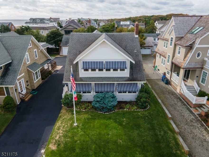 It doesn't get better than this!  This is the home you've been waiting for!  Rarely does a property this close to the ocean become available, in a town as sought after as Sea Girt.  Just a few doors from the beautiful Sea Girt beaches, no streets to cross, beach access as you reach the boardwalk.  Well maintained Victorian, traditional sea shore home.  Four bedrooms, wrap around enclosed back porch that leads to the deck.  Front porch is also enclosed, as is the upstairs porch, with views of the ocean just down the street.  Apartment over the garage with kitchenette and full bath.  Don't miss out on this rare, ocean block opportunity.