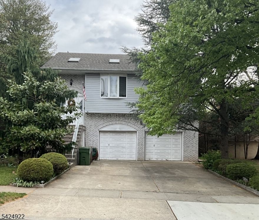 Priced to sell quickly! Spacious custom home, has 1st floor in-law suite with separate entrance, Convenient location, near public transportation, shopping, schools and houses of worship. Additional finished rooms in basement 24x13 and 14x11