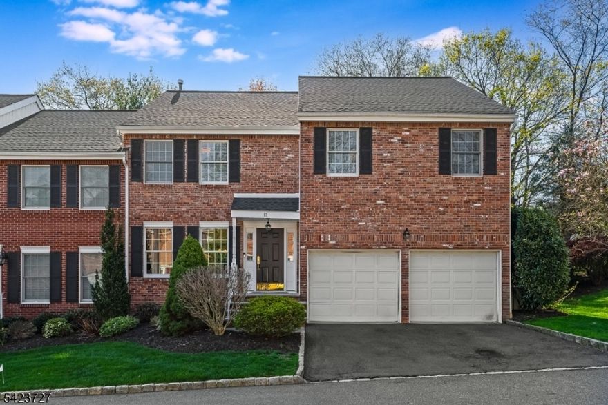 Special opportunity to own a stunningly renovated three bedroom, three bath end unit townhome in Westfield! Step into a gracious formal living room featuring a gas fireplace, custom millwork, and built-in bookcases, flowing seamlessly into a formal dining room, perfect for entertaining. The kitchen was just updated with quartz countertops, stainless steel appliances, and has a beautiful herringbone hardwood floor, opening to a sun filled family room with French doors leading to a gorgeous new bluestone patio. Upstairs, you'll find three spacious bedrooms, a convenient laundry room, and two full baths, including a newly renovated spa like primary bathroom with a soaking tub and double vanity. A perfect blend of style, comfort, and easy living, this one truly has it all.