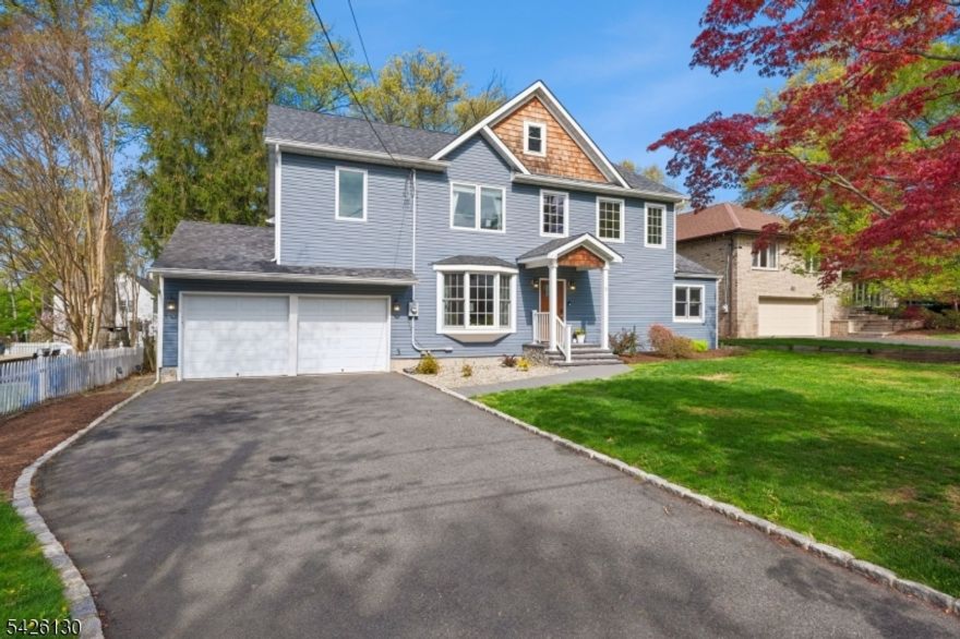 Rebuilt and reimagined in 2015, this beautiful 5 bed, 3 bath home set back on a quiet coveted street, is the turnkey dream you've been waiting for.Updates abound in this light filled, spacious home including a gut-reno 1st floor bath,french drains,rebuilt front porch & EV charger to name a few and two-zone central A/C to keep every season comfortable. A soaring 2-story entry sets the tone, where natural light pours through oversized windows & cascades across gleaming hardwood floors.The designer kitchen with center island anchors the main level with style & function, while a seamless flow leads to a formal dining room and sunroom.Two beds and a full bath on the 1st floor can act as the perfect in-law or au pair suite and work from home office. Upstairs,the expansive primary suite steals the show w/tiered tray ceiling, generous WIC, and timeless ensuite bath. Additional spacious bedrooms offer exceptional closet space (one used as a craft space!) and abundant natural light.The second-floor laundry makes everyday living effortless. Downstairs, a full basement with 7+ foot ceilings, featuring newer french drains & sump pumps, is primed (already plumbed for a full bath!) to be finished to your vision. Enjoy easy outdoor living with a level backyard and mature landscaping. Moments from St. Cloud Elementary, Turtleback Zoo, golf courses & downtowns of Montclair, Verona & South Orange, w/NYC jitney right at the corner and legendary trick-or-treating come October--this is the one!