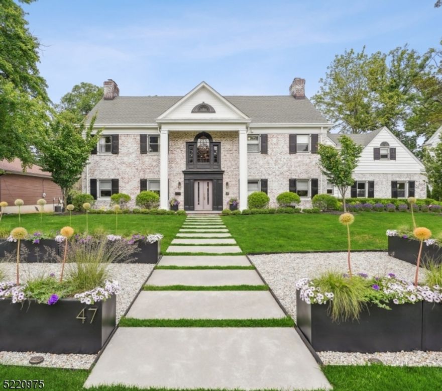 No expense was spared in the exquisite design of this luxury home located in the heart of the prestigious Newstead neighborhood. Designed with a modern sense of style reminiscent of a boutique hotel, bespoke finishes, period details, and modern amenities combine in this showstopping Georgian Colonial, which was featured in NJ Monthly Home & Style. Dramatic lighting, bespoke wall and ceiling treatments, and custom window treatments are found throughout. The chef's kitchen features professional-grade appliances, including a 6-burner range, single-door refrigerator and freezer and wine cooler, quartz counters and a huge island, walk-in pantry, and built-in dining banquette. Nearby find a cozy family room and powder room with frescoes-inspired wall treatment. A formal living room, dining room, and the 'Hemingway den' complete this level. A turned staircase with a Palladian window takes you upstairs to find 6 bedrooms, 4 full baths, and bonus office/flex space arranged across the upper levels including a luxurious primary bedroom suite with a custom walk-in California Closet/dressing room and spa-like en-suite bath. Set back from the road on over 1/3 acre, the landscape features perennial plantings, a striking front walkway flanked by modern planters, outdoor lighting, and a large patio with an awning overlooking a lush, fenced yard. Close to vibrant South Orange Village with a jitney stop just around the corner, you'll find easy access to local shops, restaurants, and NYC trains.