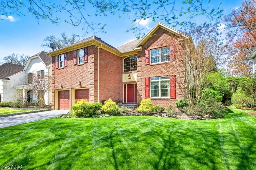 This beautifully updated and meticulously maintained 4-bedroom, 3.1-bath Colonial reflects quality craftsmanship and pride of ownership throughout.At the center of the home is a chef's kitchen winner of Topline Appliance's 2012 Best Kitchen Design featuring a spacious walk-in pantry and a large center island that naturally brings people together for everyday living and entertaining. The kitchen opens to the inviting living room with a fireplace, creating a comfortable and functional space, while also connecting seamlessly to the formal dining room. French sliding doors from the breakfast nook lead to a bluestone patio with a stacked stone knee wall, built-in bar, 42" Lynx gas grill, and refrigerator well-designed for outdoor gatherings. Upstairs, four generously sized bedrooms provide excellent closet space. The primary suite includes three closets one a walk-in and a spa-like bath with soaking tub and oversized glass-enclosed shower. The second-floor office offers versatility and can easily function as a sitting room for the primary suite.The finished lower level adds meaningful living space with a family room, custom bar, and room for a gym or pool table, along with a full bath.This Westfield Colonial offers many thoughtful updates, strong functionality, and a layout that works for both everyday living and entertaining. Located on a well-loved street in the McKinley School district, this home is an exceptional offering. Bonus: Front and back lawn sprinklers.