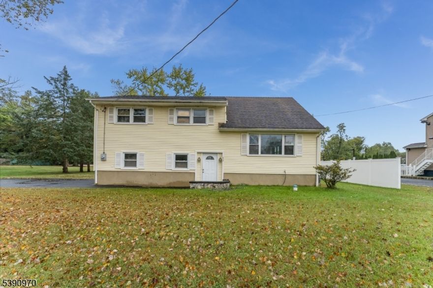 Located in the highly regarded Hillsborough School District, this beautifully cared-for split-level home sits right in the heart of town, offering a warm, flexible layout. Whether you?re looking for comfortable everyday living or the perfect setup for a home-based business, this property rises to the occasion. The lower level offers a full bath, dedicated laundry room, and flexible space that supports both productivity and everyday ease - it can serve as a comfortable living area or a private home office. On the main floor, sunlight fills the home through large windows, brightening the inviting family room, the dining area, and the kitchen. From here, step right out to the backyard?an ideal spot for gatherings, quiet evenings, or simply enjoying the outdoors. A brand-new patio is scheduled for installation in Spring 2026, adding even more charm to the space. Upstairs, 3 comfortable bedrooms and a full bath offer peaceful retreats, each with generous closet space. At the very top of the home, a spacious bonus area?create a home office, a studio, an extra bedroom. Private driveway and street parking, convenience of being close to shopping, dining, parks, and major commuter routes. With easy access to key highways and the added benefit of an exceptional school district, this home truly stands out. Flexibility, comfort, and prime location - this gem offers the best of both worlds. Enjoy peace of mind with brand-new central air, new water heater, new boiler, and new washer/dryer.