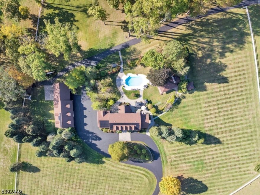 LUXURY. LIFESTYLE. PRIVACY.. Welcome To This Extraordinary 30-Acre Equestrian Estate- A True Masterpiece. Nestled Majestically On 22.66 Acres, The Main Residence Spans 8,500+ Sq Ft Of Refined Living Showcasing 6 Bdrms, 9 Bths, & Exceptional Architectural Detail Throughout. A Private Gated Entry Opens To A Long, Scenic Driveway Lined W/ Lush Manicured Grounds Leading To The Impressive Front Entrance. Turn-Key & Open To A Dramatic 2-Story Foyer Drenched In Natural Light, This Home Captivates W/ A Bright, Airy Ambiance & Soaring Cathedral Ceilings. The 1st Level Feat. A Grand Living Room, Formal Dining Room W/ Custom Millwork, & Gorgeous Family Room W/ A Wood-burning Fireplace & Butler's Bar-Perfect For Entertaining. The Gourmet Kitchen Feat. Custom Cabinetry, Granite Countertops, Premium SS Appliances, & Stunning Views Of The Picturesque Grounds. Upper Levels Feat. Add'l Bedrooms, Baths Incl. The Expansive Hotel-Like Primary Suite W/ A Gorgeous Marble Bath w/ Custom Features Throughout. Enjoy A Resort-Style Oasis Outdoors Feat. A Custom Pool House W/ An Indoor Kitchen & 2 Poolside Baths Ideal For Large Gatherings Or Relaxing In Total Privacy. The Estate Incl. 16 Horse Stables, Riding Areas & A Carriage House W/ Living Quarters. Included Is A 7.51-Acre Residential/Agricultural Lot- Fully Buildable W/ Endless Potential To Expand The Compound. This Gracious Estate Embodies The "Hollywood Hills" Of Green Twp. Where Country Elegance Meets Sophisticated Living, Just 1 Hr From NYC!