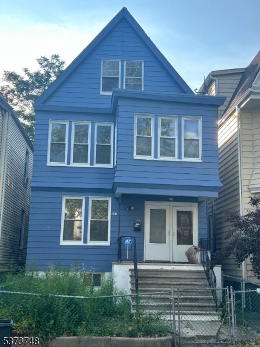 Attention savy investors and first time home buyers. Stunning Income-Generating in East Orange " Flip Opportunity! Step into this charming 1925-built two-family home, ideally located near transit, parks, and shops. The first-floor unit has the potential to offer 2 bedrooms, a modern eat-in kitchen, luxe hardwood/tile floors, and a spacious living/dining area.The second-floor unit features 3 bedrooms, 1 bath, and attic rooms awaiting your design vision perfect for modern rental demand. Both units have separate utilities and heating, ensuring rental efficiency.Attic and basement each has its own separate entrance which could be renovated into a separate space.Don't miss your chance to own and flip a versatile, cash-flowing property in an in-demand East Orange neighborhood... Short Sale approved by bank!