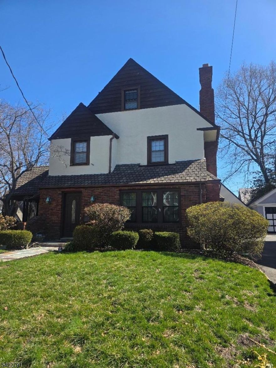 Welcome to this beautifully maintained home boasting pride of ownership!  Located in a sought-after historic district, where timeless character meets modern comfort. Featuring 4 Bedrooms with ADDITIONAL BONUS ROOM and 2.5 Baths , this property offers total useful space of over 2800 sq ft spacious and functional layout ideal for both everyday living and entertaining. Step inside to find a bright and inviting interior with hardwood floors, original architectural details, some modern finishes, windows that fill the space with natural light. The living and dining areas flow seamlessly, creating a warm and welcoming atmosphere. Upstairs/downstairs, you'll find generously sized bedrooms, including a Second floor BONUS ROOM. Outside, enjoy a private backyard perfect for gatherings, gardening, or simply unwinding. Additional highlights include 2 car garage, finished basement & 2 fireplaces. Situated in a charming historic district, this home offers unique character, tree-lined streets, and a true sense of community while still being close to schools, parks, shopping, public transportation. Don't miss your chance to own a piece of history with all the comforts of modern living!