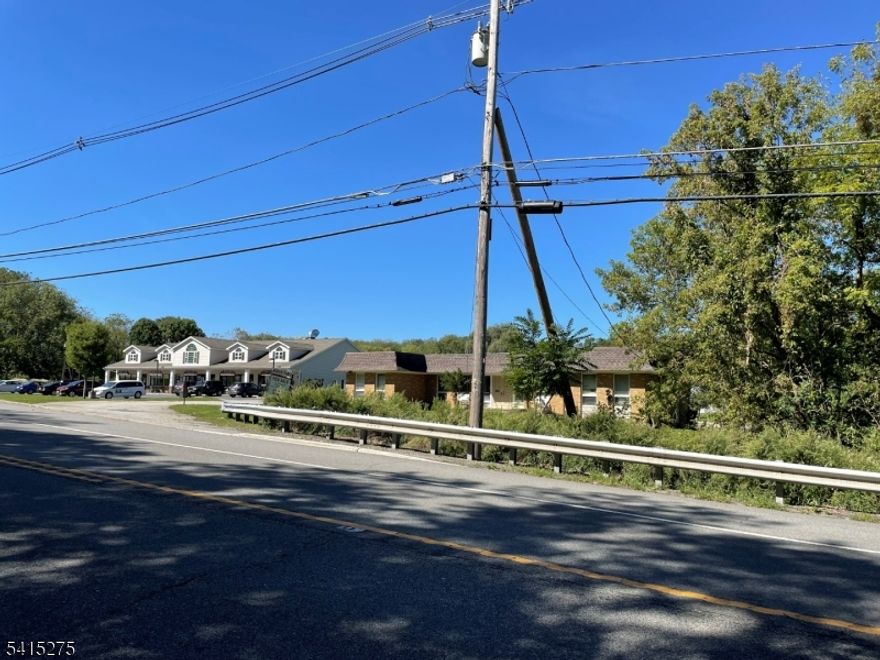 1.65 acres of commercial land approved for 6,200 square feet of retail/office space located along State Route 94 in Hardyston Township. Site can accommodate and is ideal for a drive-thru facility (subject to Township approval). Site has an existing building that needs to be knocked down or renovated. It is currently not usable. The Site is situated in front of residential developments with over 800 residents. Another 6,200 square retail center is built and fully rented right next to Site. Property is located next to the Sussex County YMCA and has a high traffic count of over 12,000 cars per day.