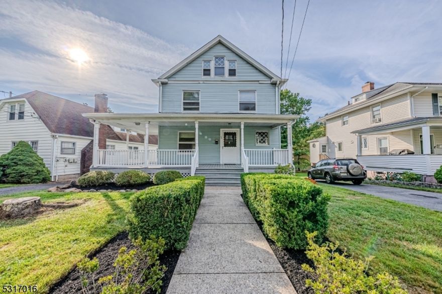 AMAZING OPPORTUNITY - HISTORIC COLONIAL in the heart of Caldwell! Grande house w/ unique architectural features. Make this your dream home! 3 Floors of roomy, spacious Living! Home features rich chestnut paneling and old world architectural features. Large foyer, open living room and dining room with pocket and swing doors. Hardwood floors. Sunny eat in kitchen is warmed by wall of windows that overlook large and level backyard. Upstairs flexibility with 4 bedrooms + additional rooms in walk up attic as office, 5th bedroom, playroom, rec room etc. Full length covered front porch perfect for rocking chair relaxation & a glass of wine. Full, walk out basement. Top Rated Schools. Right around the corner from Bloomfield Avenue, Caldwell University and public transportation stops. TONS of potential.