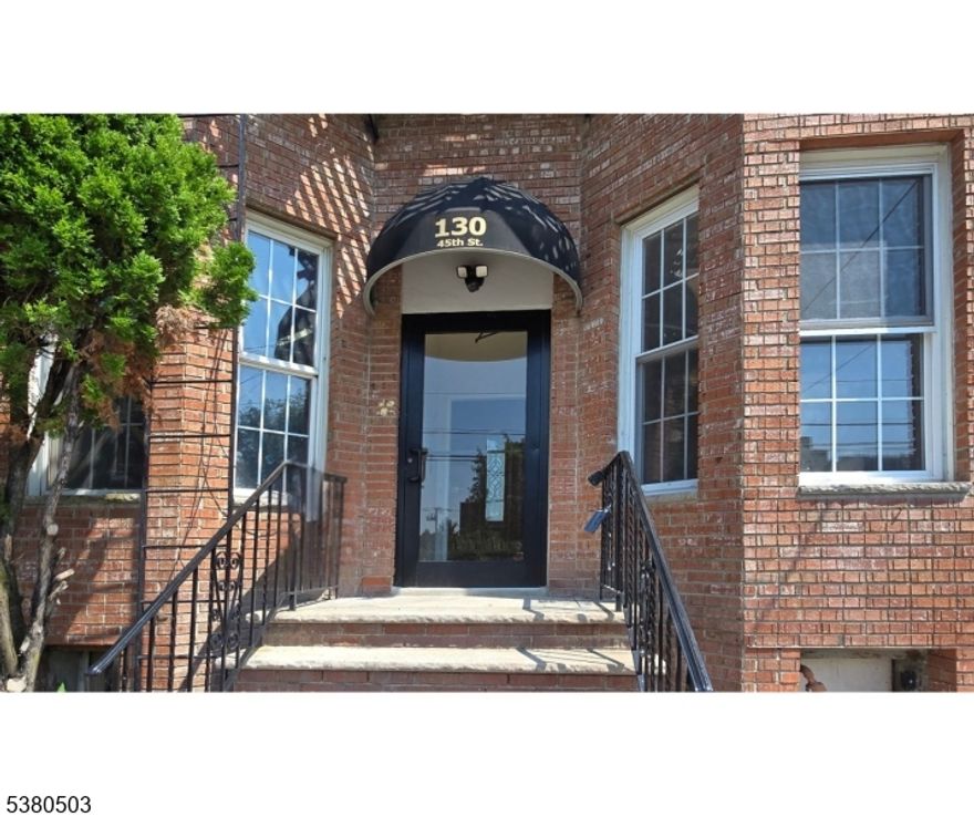 Welcome to 130 45th Street, a stunningly updated 2-bed, 2-bath condominium offering 670 sq ft of thoughtfully designed living space in a boutique 6-unit building. This bright, open home features a gorgeous new kitchen with granite countertops, a peninsula breakfast bar, modern pendant lighting, and brand-new stainless-steel appliances. The warm hardwood floors, high ceilings, and recessed lighting create a sophisticated and airy atmosphere throughout. The layout includes a spacious primary suite with a private bath, a second full bathroom, and a comfortable second bedroom. Each unit has its own dedicated basement storage, adding convenience. Everything in this home is brand new HVAC, finishes, fixtures allowing you to move in with complete peace of mind. Perfectly located near local shopping, dining, and transportation options for an easy NYC commute, this condo combines modern comfort with unmatched convenience.