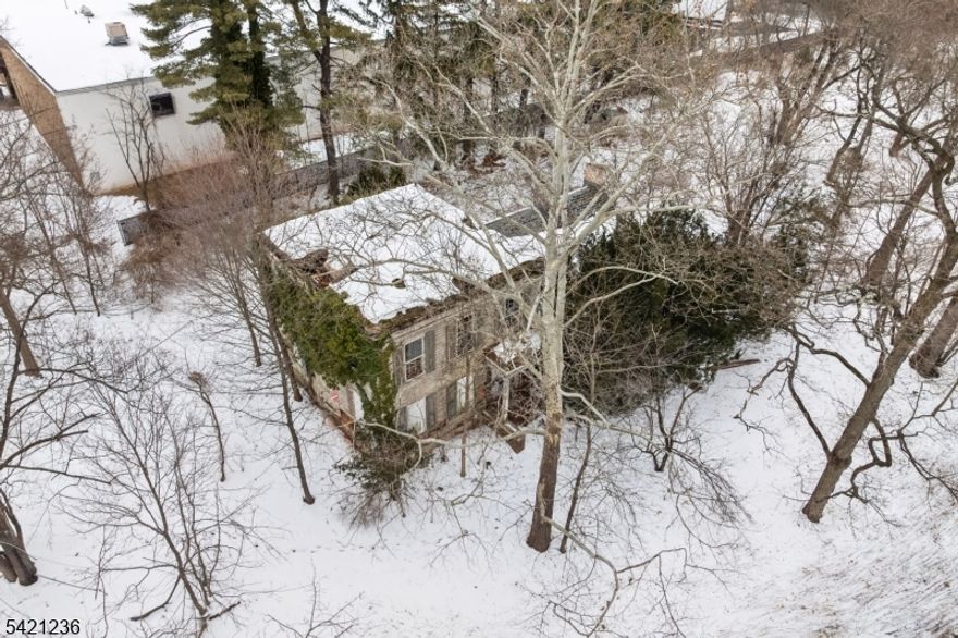 Rare opportunity to own 2.75 acres of land rich in history and potential. This unique property is home to an original structure dating back to the 1700s, with an addition completed sometime in the 1800s. While the existing home has experienced fire damage and is not currently habitable, it presents a blank canvas for redevelopment. Value is in the land, making this an ideal opportunity for builders, investors, or end-users looking to create a custom estate. The seller has already completed a wetlands review, providing valuable preliminary due diligence for future plans. With its generous lot size and layout, there may be a potential opportunity for subdivision (buyer to perform their own due diligence and verify with the township). Whether you're looking to build your dream home, explore development possibilities, or invest in a sizable parcel with character and history, this property offers endless potential. All utilities gas, electric and water in the street.