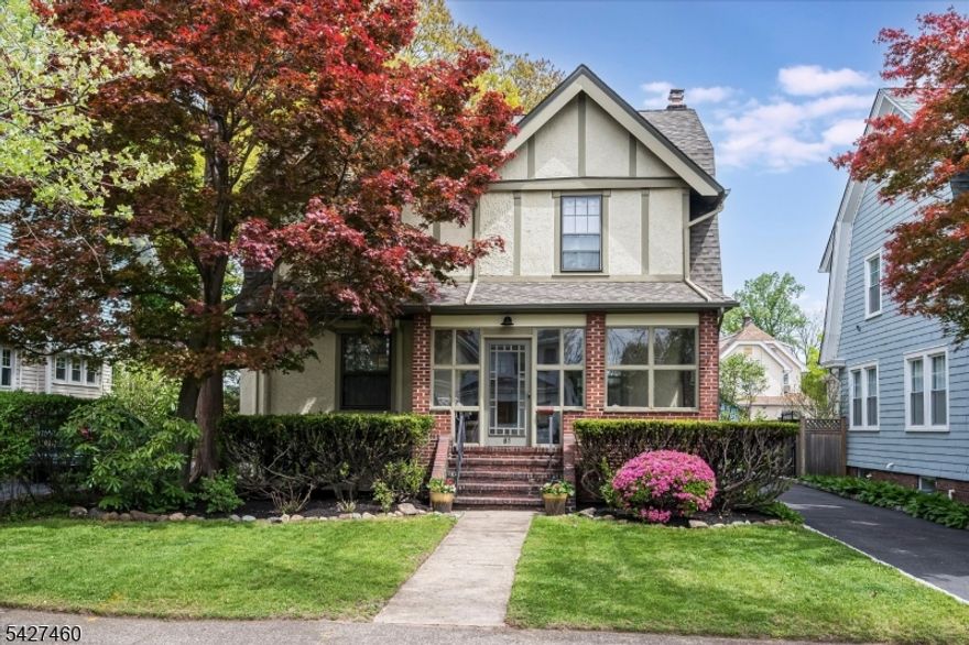Storybook charm meets everyday functionality in this beautifully maintained Craftsman Colonial, ideally located just a short trip to the Midtown Direct train and vibrant downtown Bloomfield Center. Brimming with character, the home showcases original details throughout, including parquet hardwood floors, a living room with fireplace and wood beam ceiling, and irresistible curb appeal. An inviting enclosed front porch extends your living space nearly year-round, perfect for relaxing or entertaining. The updated kitchen features a separate butler's pantry along with dedicated table space and built-in bench seating, creating a warm and practical hub of the home. The second level offers three bedrooms and a full bath, while the third floor provides a fourth bedroom plus a flexible office or playroom. A finished basement with a full bath and rec room adds even more versatile living space. Enjoy the best of both worlds with close proximity to Watsessing Park and your own private, park-like backyard oasis complete with patio, shed, and one-car detached garage. Near Six Points, FoodTown, Washington Street shops and restaurants, and local favorites like Skidoo Coffee, this home blends timeless charm with modern convenience.