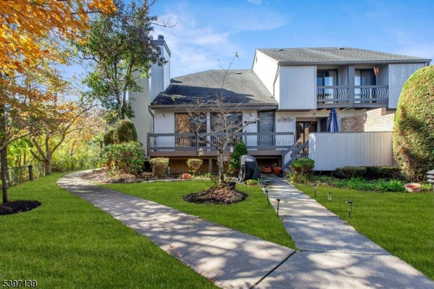 Welcome to 32 Magnolia Court, a beautifully maintained 2-bedroom, 2.5-bath home offering warmth, comfort, and style in one of the highly desirable Southridge Hills communities of Monmouth Junction! Step inside to discover gleaming hardwood floors that flow throughout the main level, along with a bright, open-concept living area perfect for entertaining or relaxing. The modern kitchen features elegant cabinetry, ample counter space, and a center island ideal for casual dining or breakfast. Upstairs, you'll find two spacious bedrooms, each with its own private balcony, offering a serene outdoor retreat. The primary suite includes a full bathroom and generous closet space. The fully finished basement provides a versatile space  perfect for a home office, guest room, entertainment area, or fitness zone, providing additional comfort and flexibility to fit your lifestyle. Enjoy peaceful mornings or evenings on your private patio, and take advantage of the community's well-kept surroundings. Conveniently located near top-rated schools, local parks, shopping centers, and major highways, this home offers the perfect balance of tranquility and accessibility. New stove and washer/dryer. Whether you're a first-time homebuyer, downsizing, or simply seeking a move-in-ready home, 32 Magnolia Court is a true gem waiting for you!