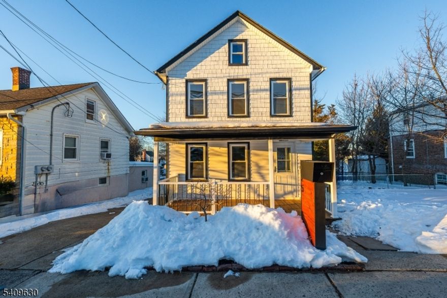 Welcome to this beautifully renovated one-family home, ideally located in one of Sayreville's most desirable neighborhoods. The first floor offers a spacious living room, an oversized dining room, and a modern open-concept kitchen, along with a full main bathroom. Sliding glass doors lead to a large, stunning deckperfect for entertaining or relaxing while enjoying serene views. The second floor features three well-appointed bedrooms, plus a generous attic providing ample storage space. Recent upgrades: New deck, Newly renovated flooring and New lighting throughout the entire home, New appliances. A true move-in-ready home combining space, comfort, and an unbeatable location.