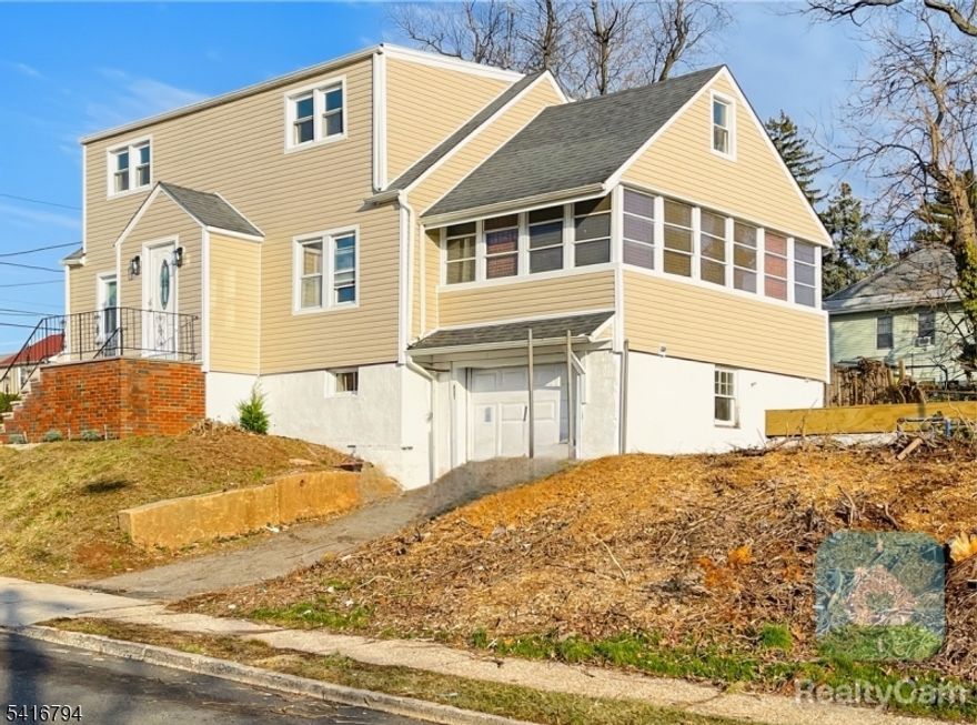 Welcome to 631 Elm Street, a beautifully renovated 3 bedroom, 2.5 baths plus option office/den/4th bedroom home set on a desirable corner lot that blends modern upgrades with functional living space. Modernized kitchen, spacious Island, wine refrigerator, dishwasher, pot -filler faucet, sunroom, central a/c, keyless entry, finished basement with 1/2 bathroom, laundry room and a direct access to the attached garage. Adjacent to the living room is a bright sunroom filled with natural light, offering a versatile space that can be used as a home office, reading lounge, creative studio, or easily converted into a fourth bedroom depending on your needs. Discover a generous backyard, creating an outdoor entertaining area. With its  thoughtful renovations, versatile layout, modern kitchen upgrades, and commuter-friendly location, this home presents a unique opportunity to enjoy modern suburban living