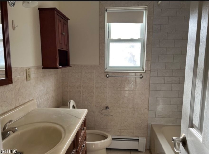 Located just off Route 10 East, this beautifully updated first-floor 2BR/1BA condo in the desirable Mountain Club community truly has it all. This unit will be delivered freshly painted and move-in ready, featuring hardwood floors throughout the living room, dining room, and bedrooms. The updated kitchen boasts quartz countertops and stainless steel appliances, perfect for everyday living and entertaining. Enjoy the convenience of an assigned parking space plus ample guest parking. Residents of Mountain Club have access to premium amenities including a swimming pool, fitness center, tennis courts. Laundry facilities located in building basement.