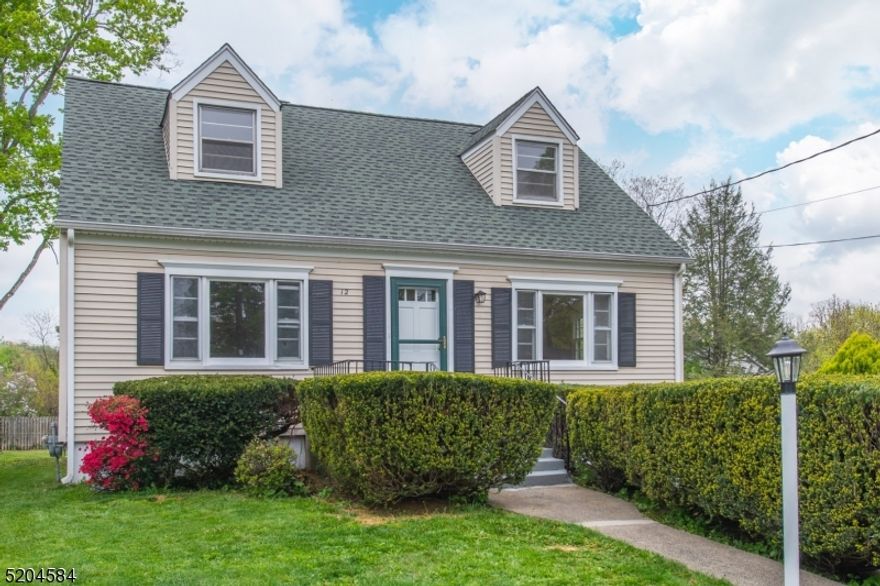 Classic Cape located within the heart of Bernardsville, minutes to most major highways!  Hardwood flooring, huge 3 season porch/sunroom, partially finished basement, 1 car garage, 1st floor bedroom, living and dining rooms. 30 year Timberline roof installed 2009, FIOS with battery backup, upgraded insulation, water heater and 97% efficiency rated natural gas Lennox furnace new in 2015, ready for upgrade to central air!  Excellent Bernardsville schools, 2 minute drive to NJ Transit Train, close to parks, shopping, dining.  The perfect location - cul de sac and spacious yard!