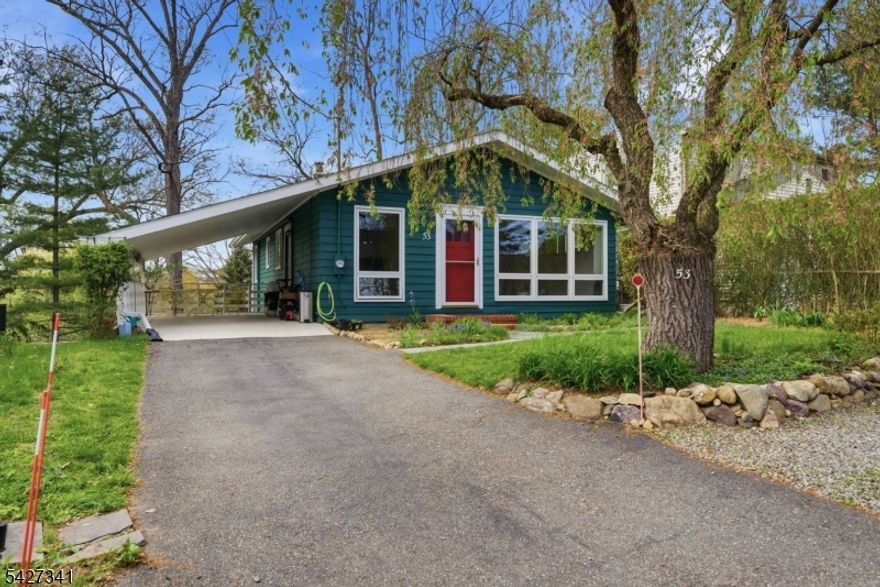 A charming & sun-filled ranch style home nestled in the Lake Arrowhead community of Denville. Perfectly positioned with peaceful lake views from the front yard, this property offers the ideal blend of natural beauty, convenience & everyday comfort, all just a short walk to vibrant DWTN Denville with its shops, restaurants & NYC transportation. Inside, the home features 3 generously sized bdrms & an updated full bath. The inviting living room is highlighted by high vaulted ceilings, creating an open & airy feel, while large windows throughout flood the home with natural light. The open-concept kitchen & dining provide a seamless flow for both daily living & entertaining. The full walkout basement offers exceptional versatility & is partially finished, currently used as additional living space with a family room & dining area. There is also a well-organized workshop, utility space & laundry, making it both functional & flexible for a variety of needs. Addtl highlights include newer retaining walls, a roof approximately 13 years old, natural gas baseboard heating & the added comfort of ductless multi-zone air conditioning & heating. Carport style parking or covered patio.. Whatever fits your needs! Enjoy all the benefits of Lake Arrowhead living, with clubhouse events, beach, boating & fishing.. including a strong sense of community, scenic surroundings & close proximity to everything that makes Denville The Hub of Morris County. Wonderful opportunity in a great neighborhood.